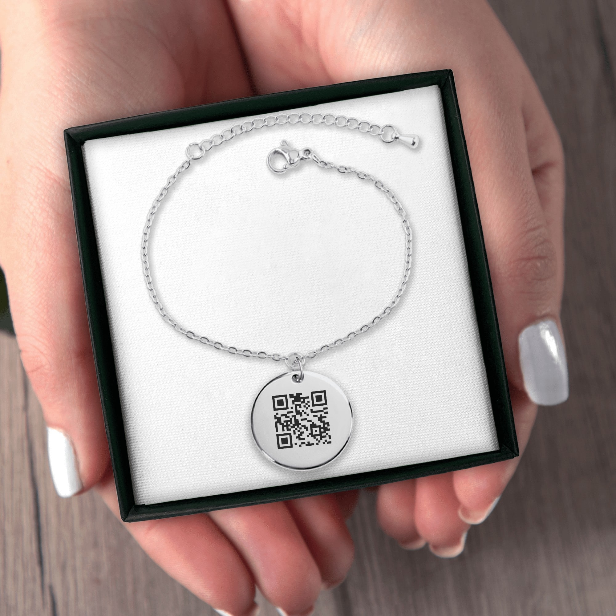 The coin bracelet in the box it is posted in.